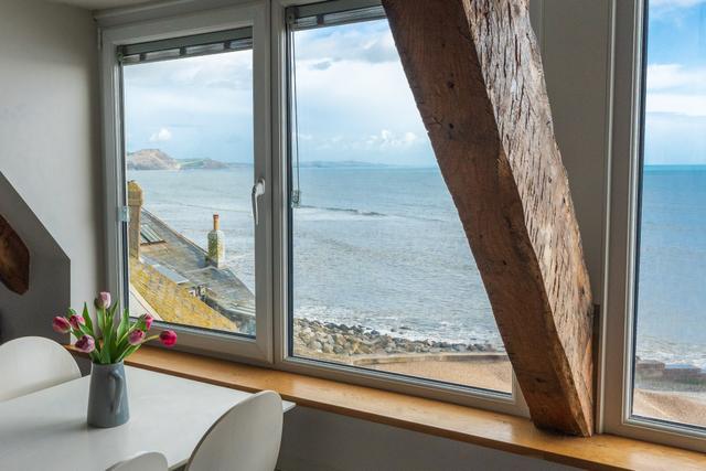 Dining table seaview to Golden Cap cliff top peak