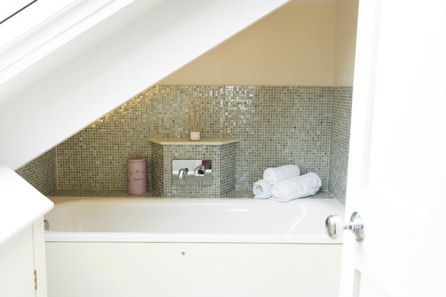 Spacious bath in bathroom