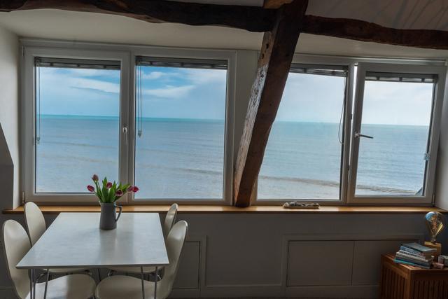 Seaview from lounge through a consecutive line of large windows