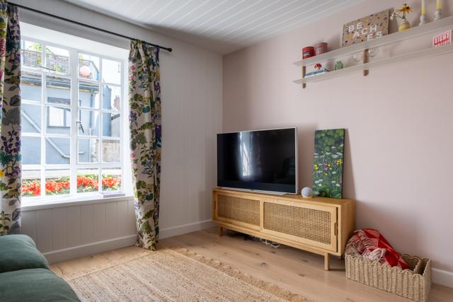 Sky glass TV and views of the river Lym cosy up on a Loaf sofa and enjoy a movie whilst on holiday in central Lyme Regis by the sea and by the river wonderful window views