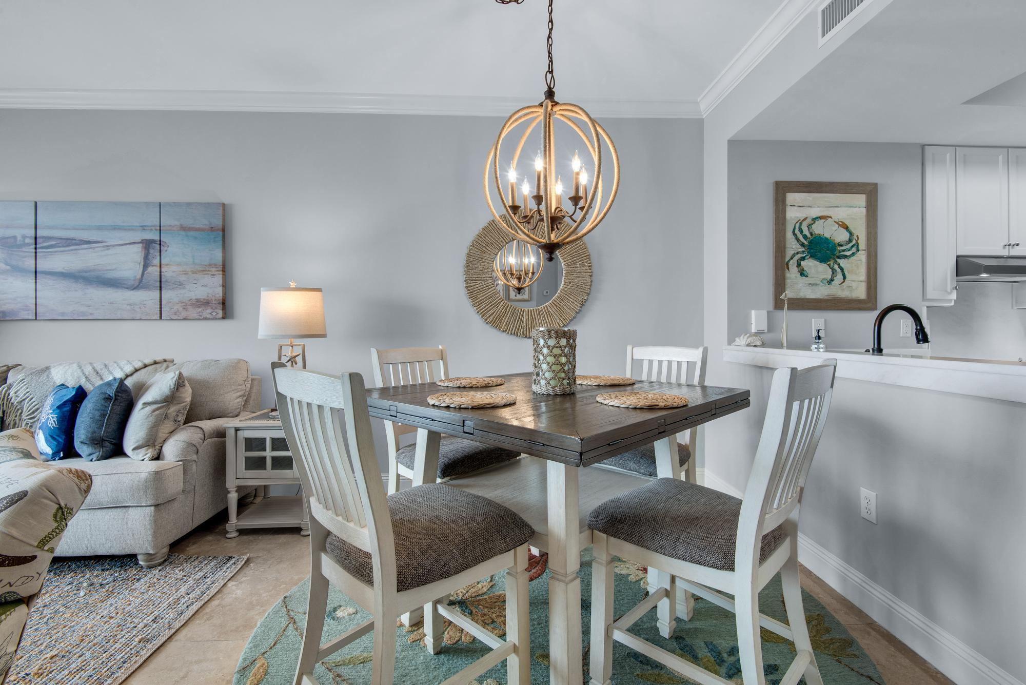 Unique arrangement of dining table for view of kitchen and view of gulf waters