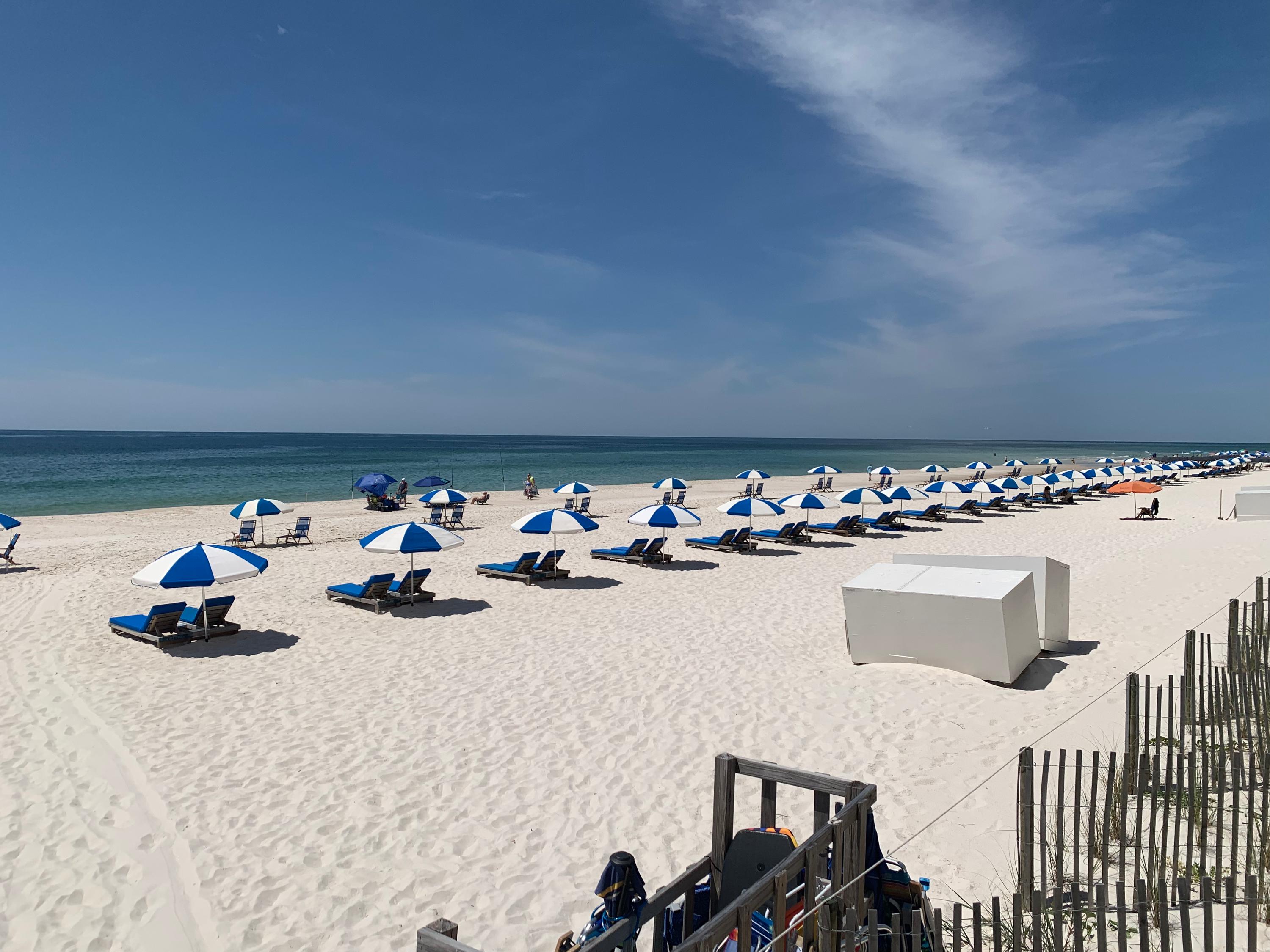 Spacious 500 ft private beach, powdery soft white sand, meticulously maintained.