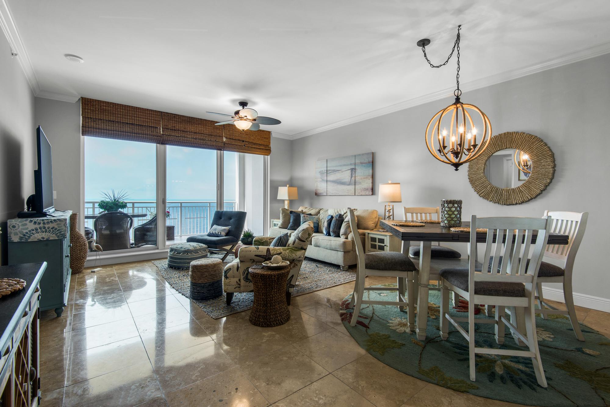 Plenty of seating for your group, with a large screen TV and easy balcony access