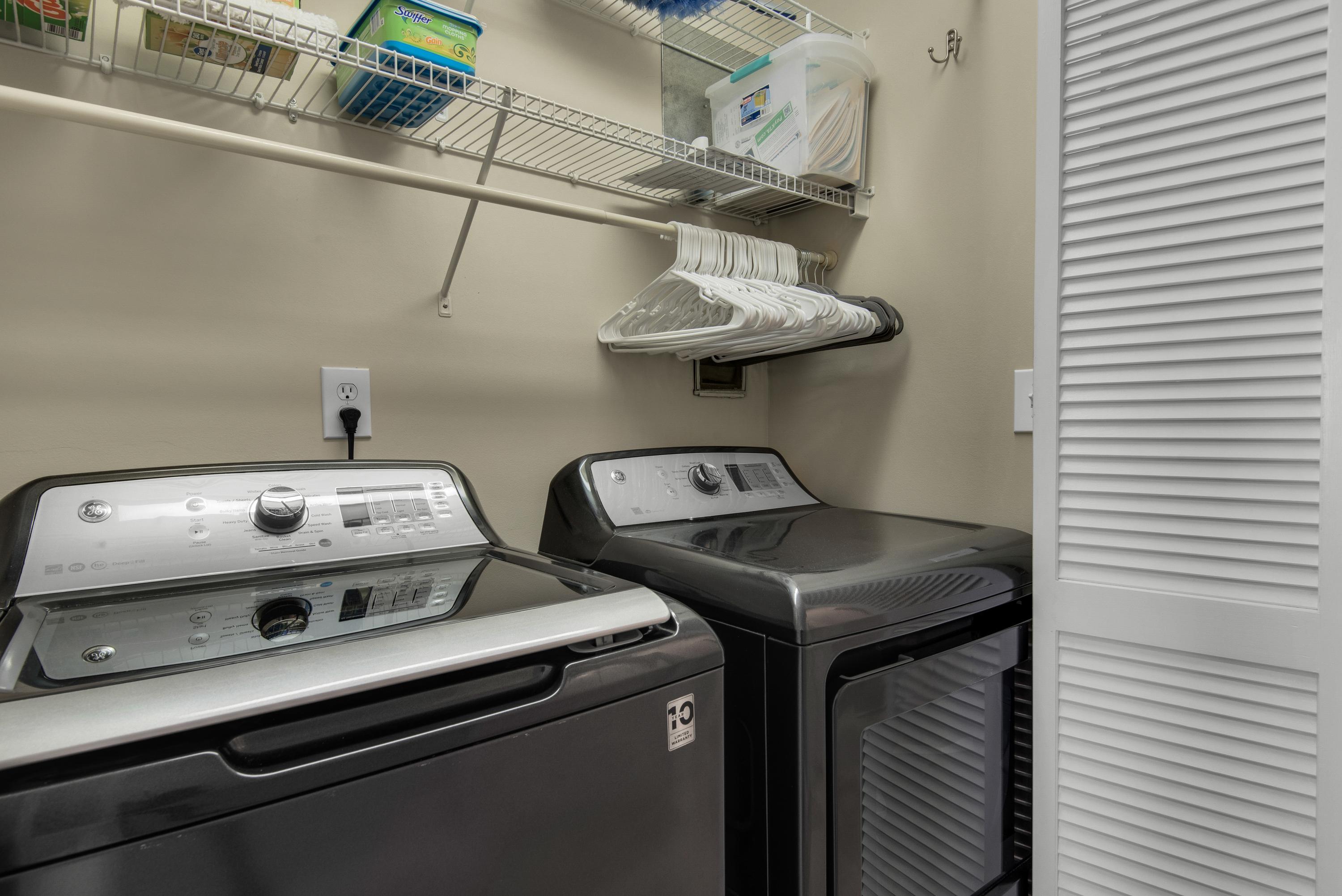 Full size washer and dryer inside the condo.
