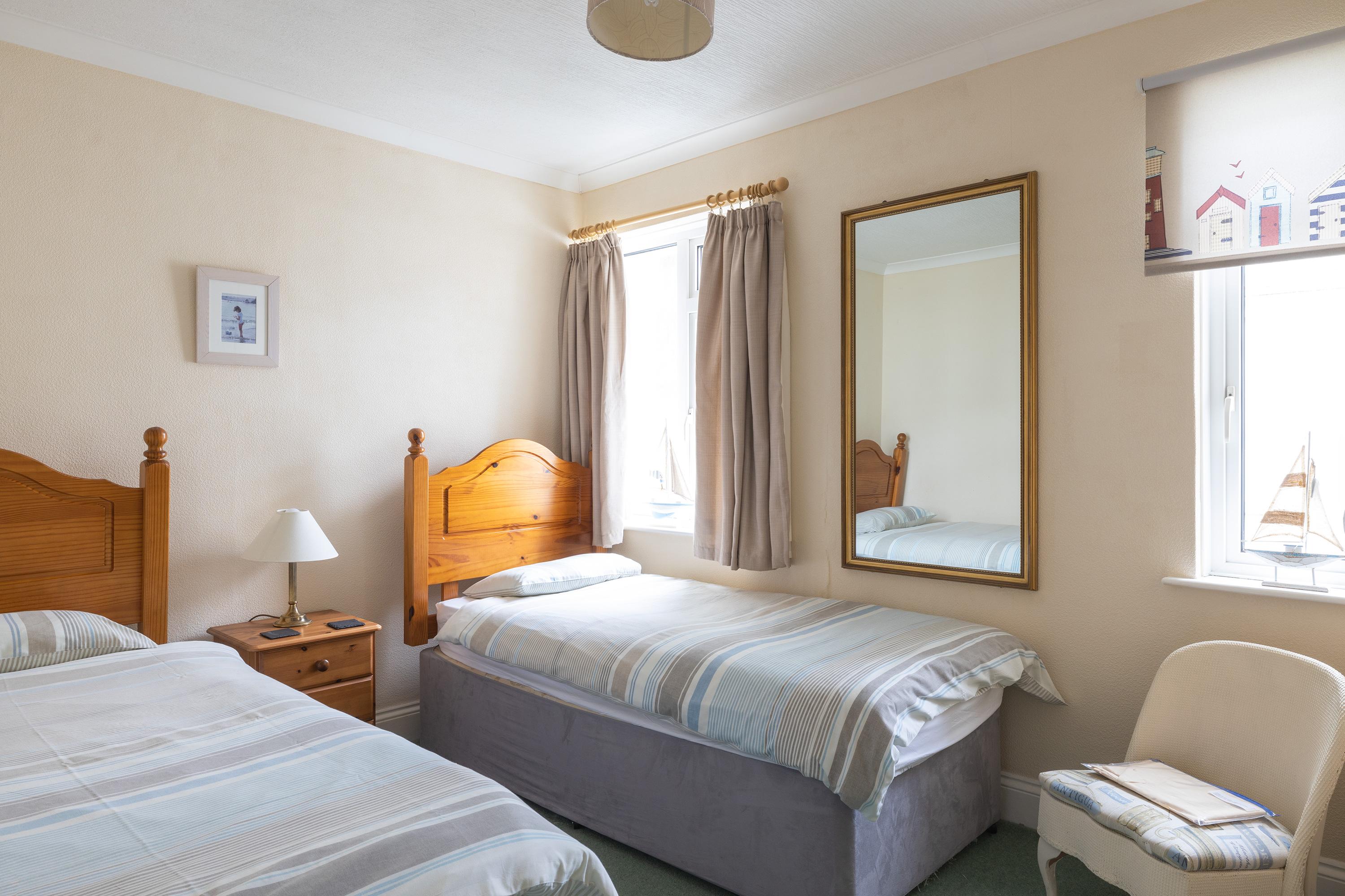 Twin bedroom at Sea Scape Cottage