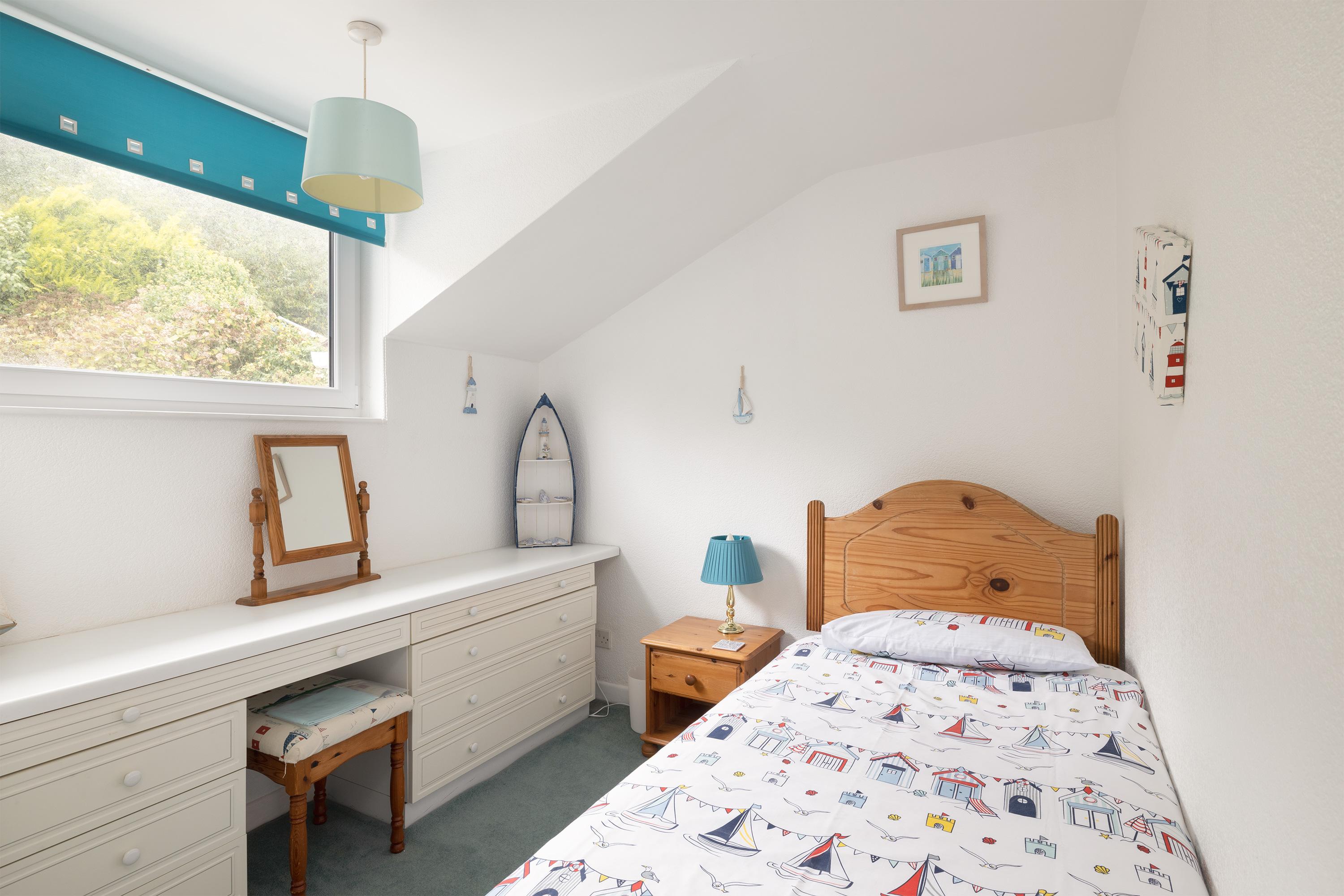 Nautical single garden facing bedroom