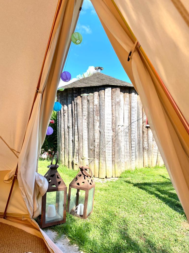 Peek outside from the inside of the lotus glamping tent