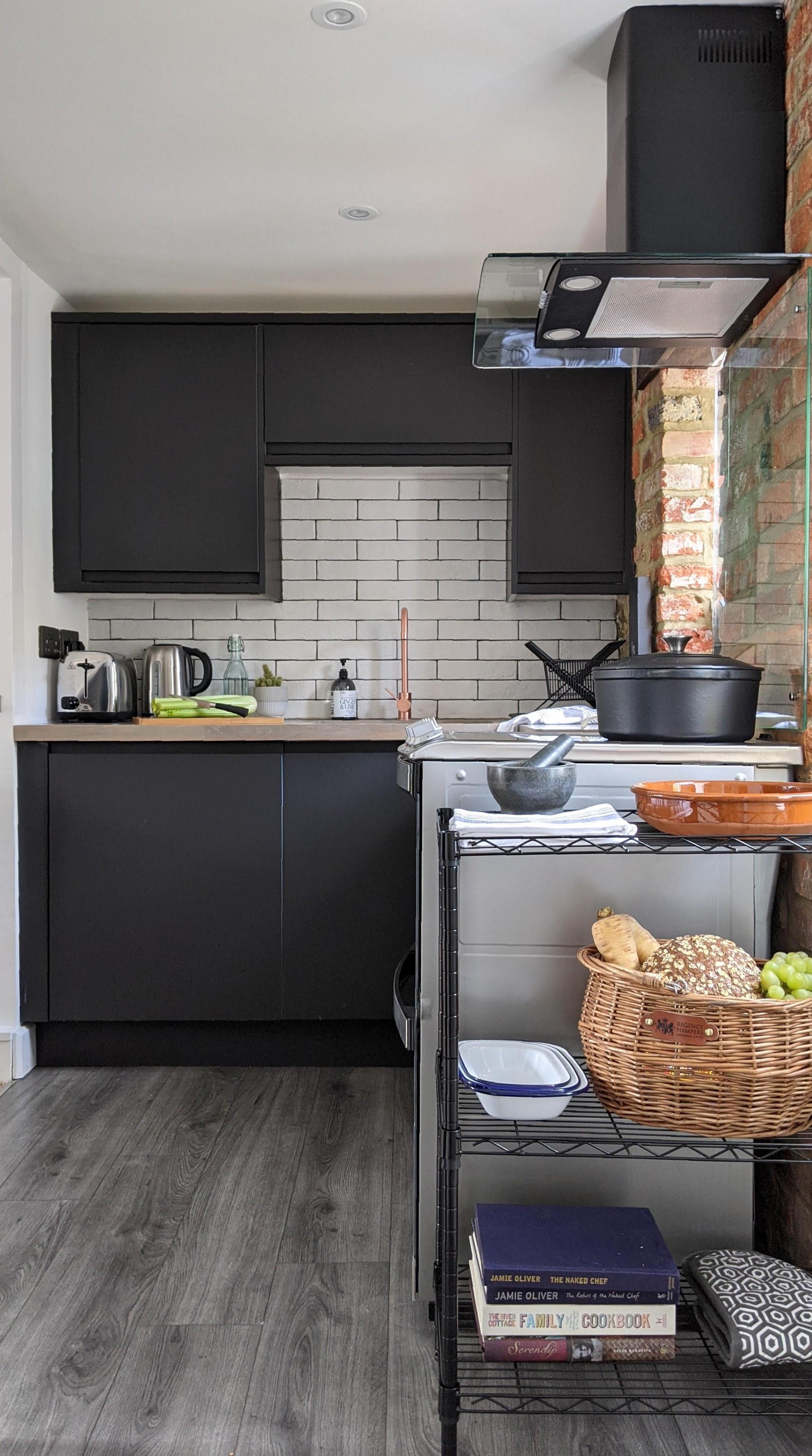 Cosy highly styled modern kitchen perfect for cooking in on your holiday with a fully stocked kitchen. Perfect for hosting dinners and lunches on holidays. 