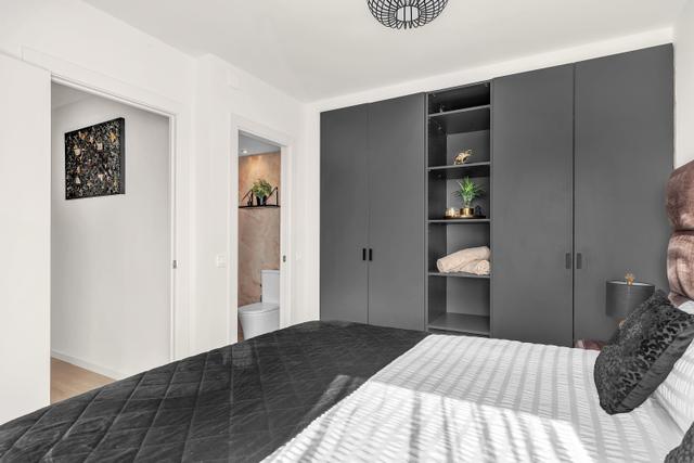 Hoofdslaapkamer met tweepersoonsbed (180x200) en airconditioning in Casa Xanti II
