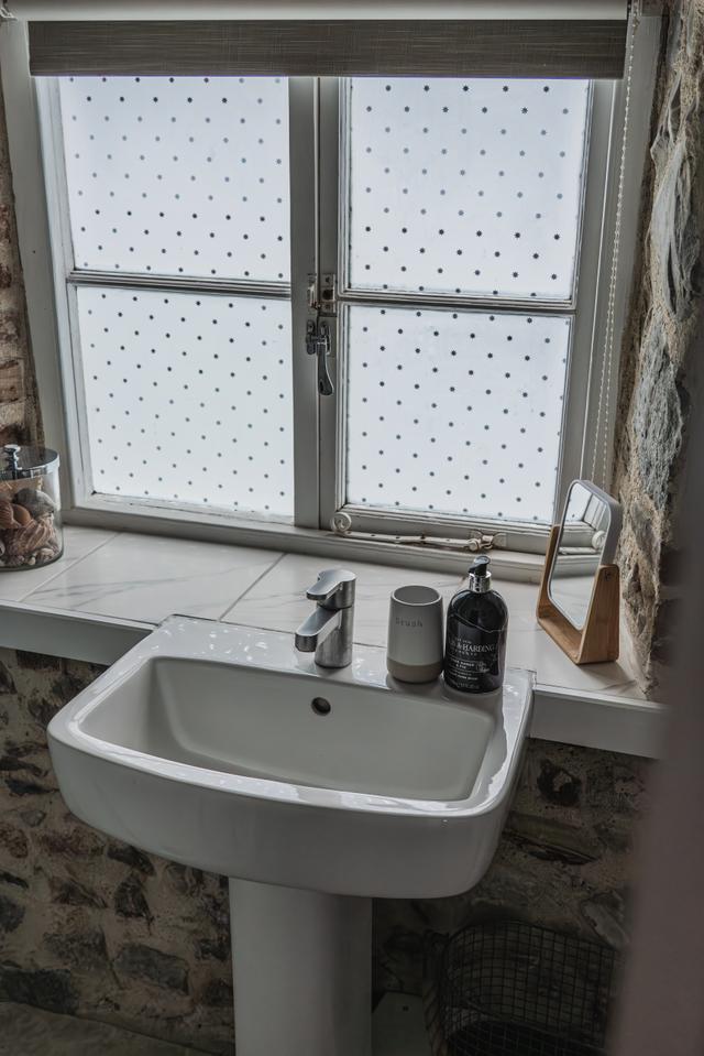 Modern bathroom with spacious walk in shower cosy and light 