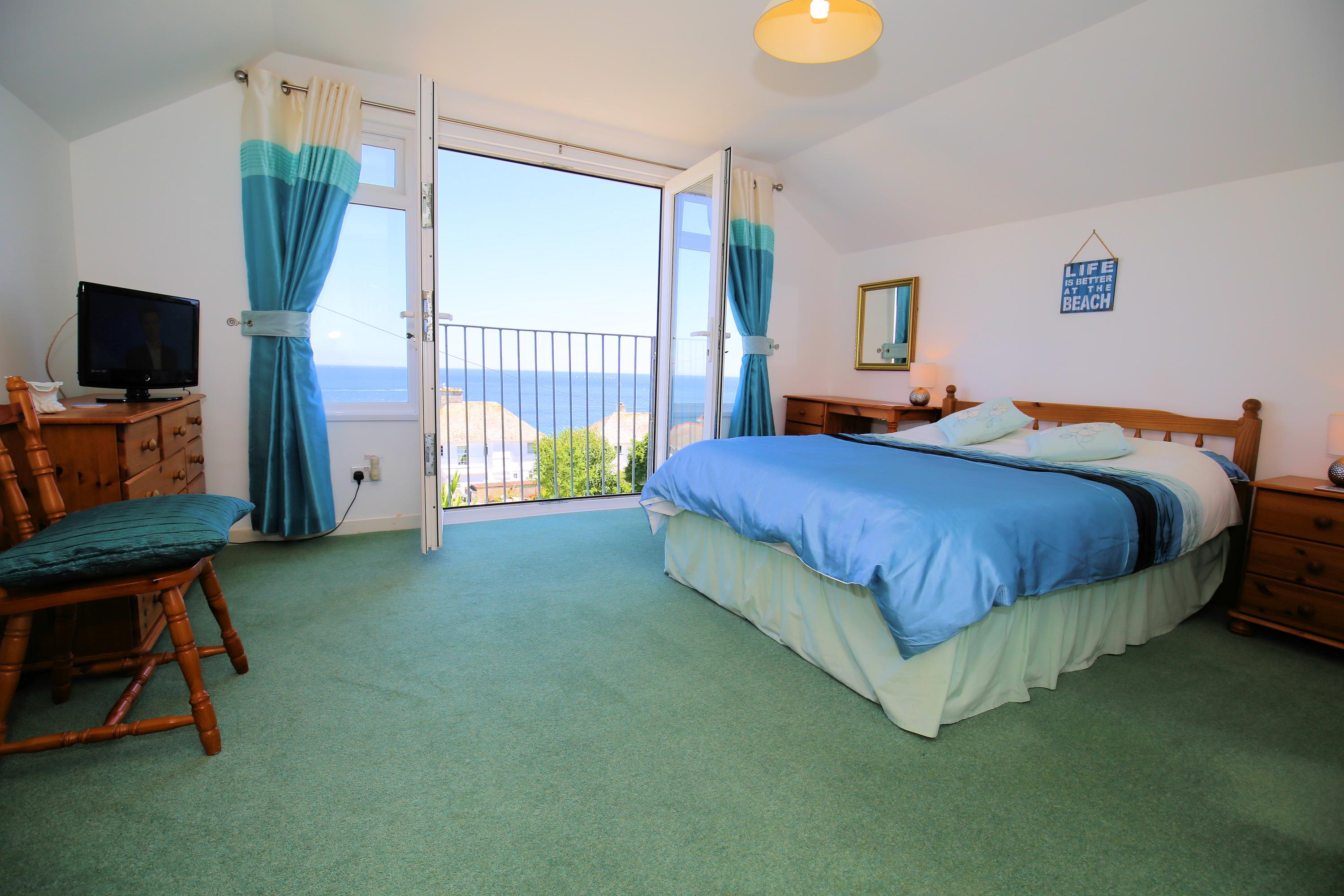 Master Bedroom with Juliet Balcony overlooking the sea