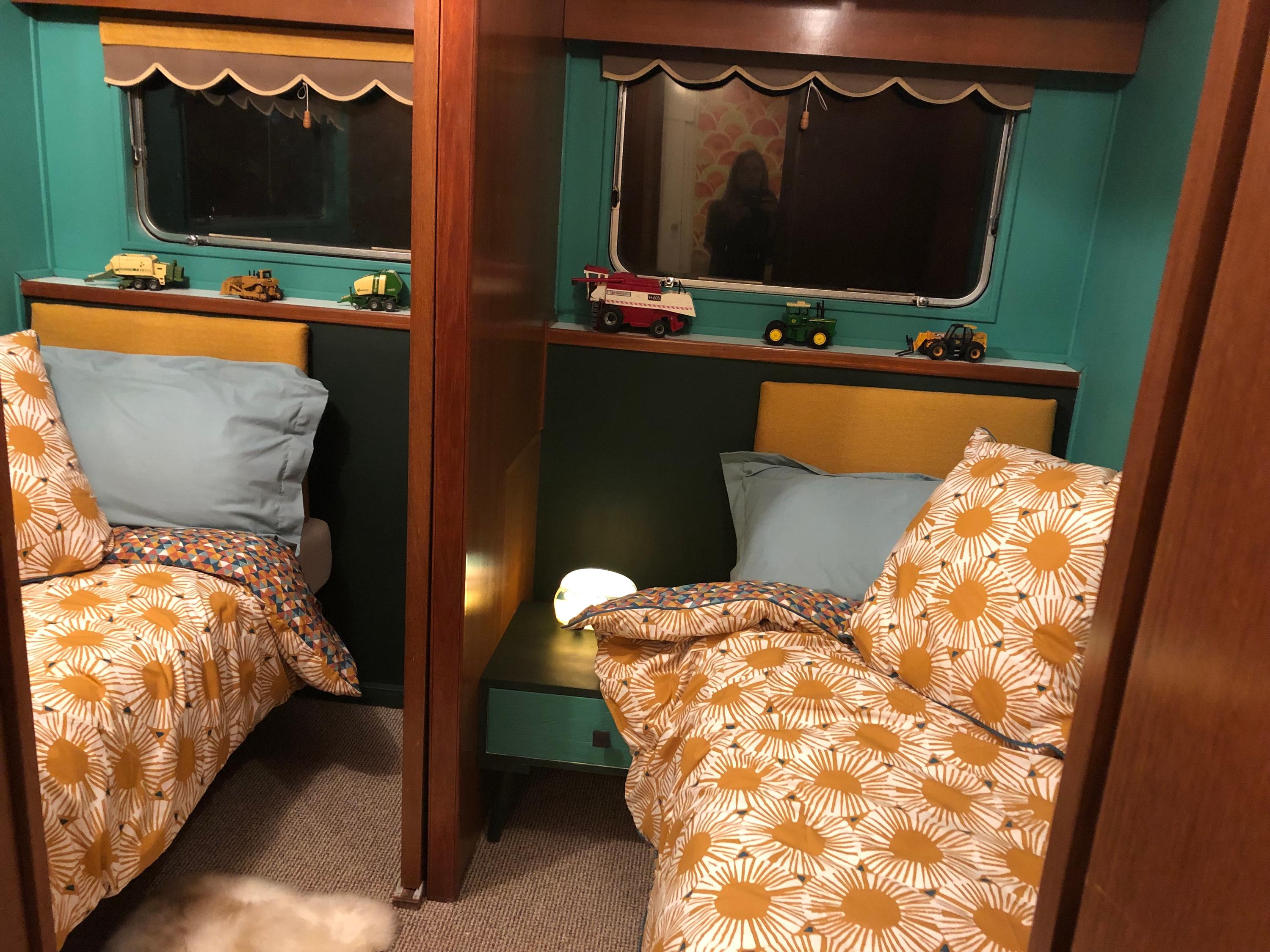 Single bedrooms split by a sliding door