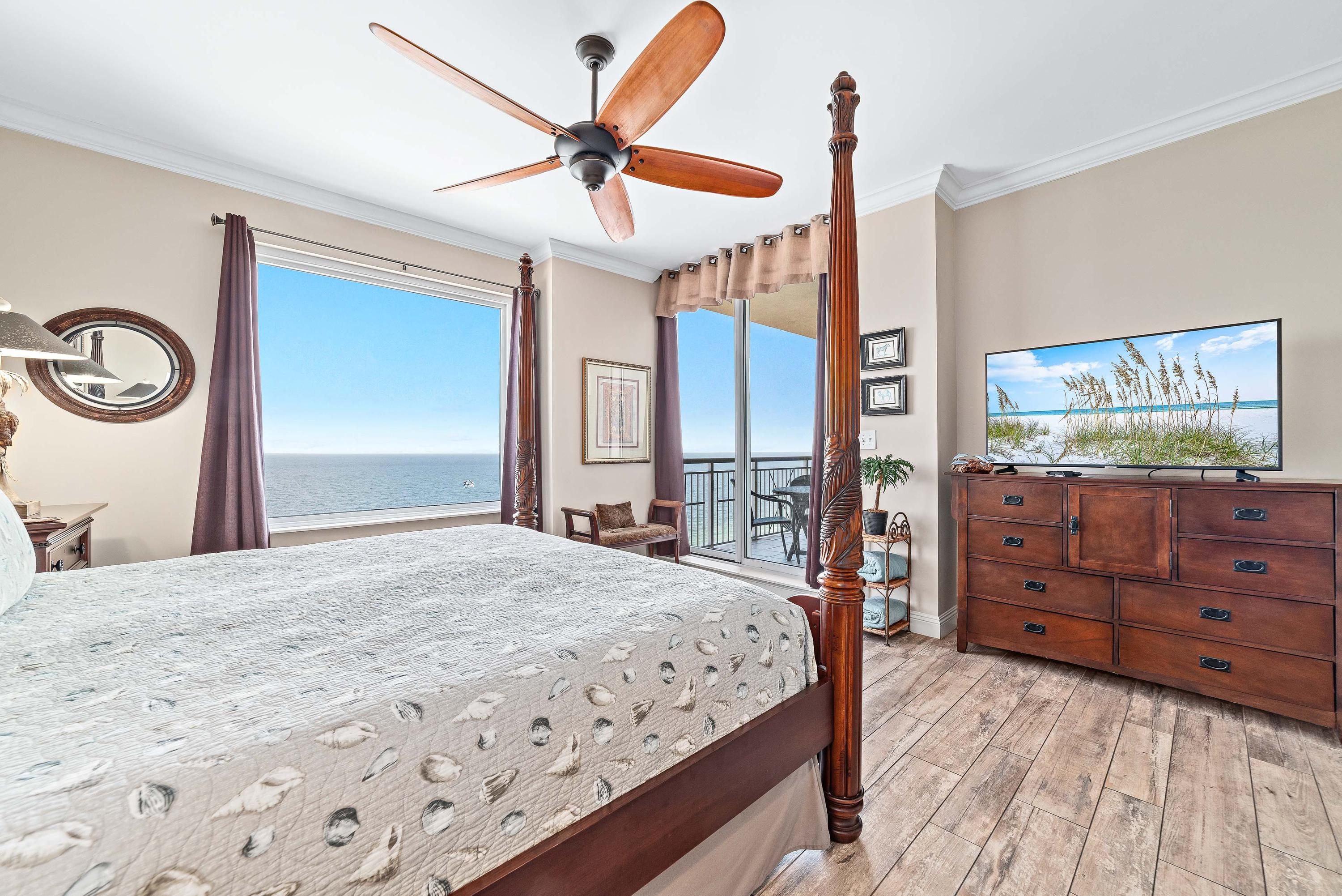 Expansive Master Suite with Large Screen TV and Gulfview window