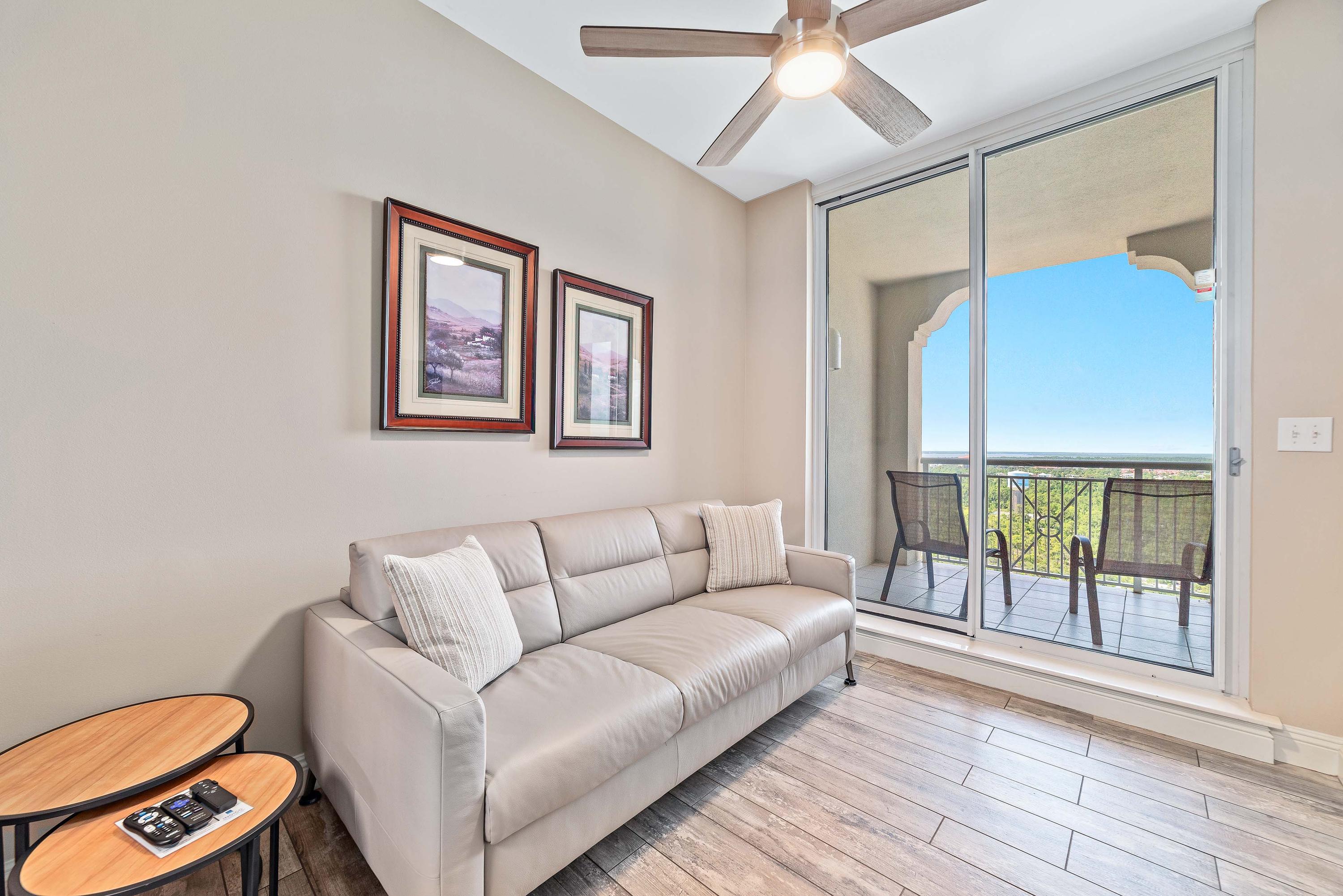 "Bonus Den" with Natuzzi Leather Sleeper Sofa that unfolds easily. Wall 50'' TV