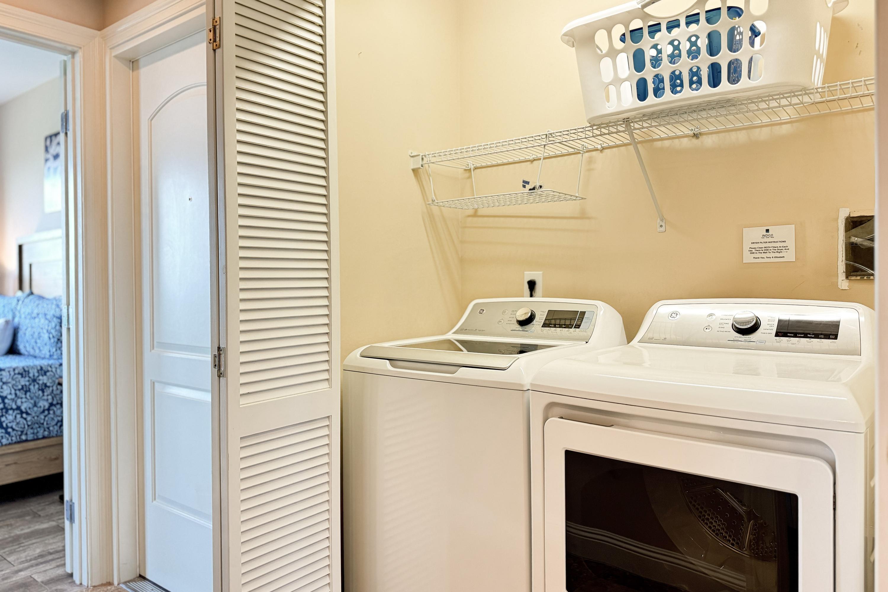 Full size washer and dryer inside the condo.