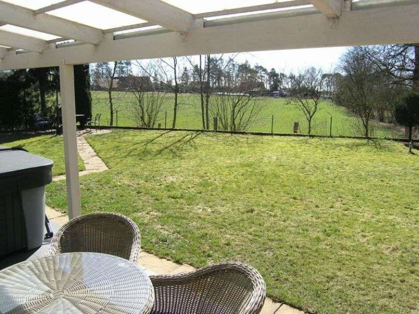 De omheinde privétuin