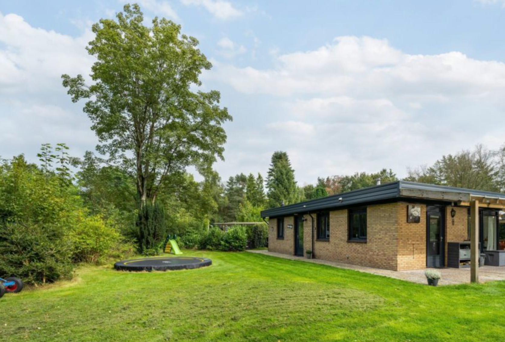 De omheinde tuin van Het Snuffelnest