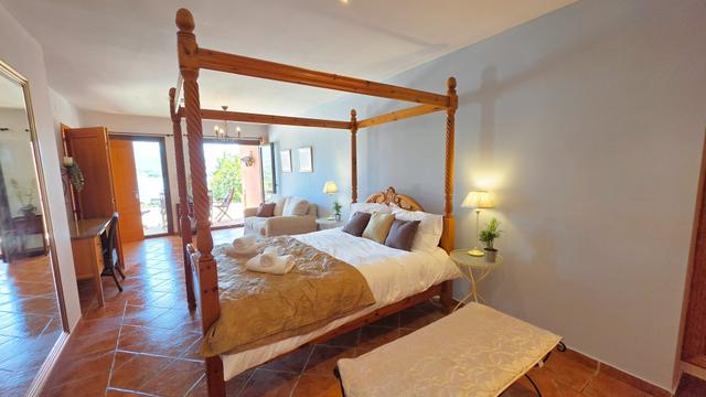 Master bedroom with an en suite bathroom
