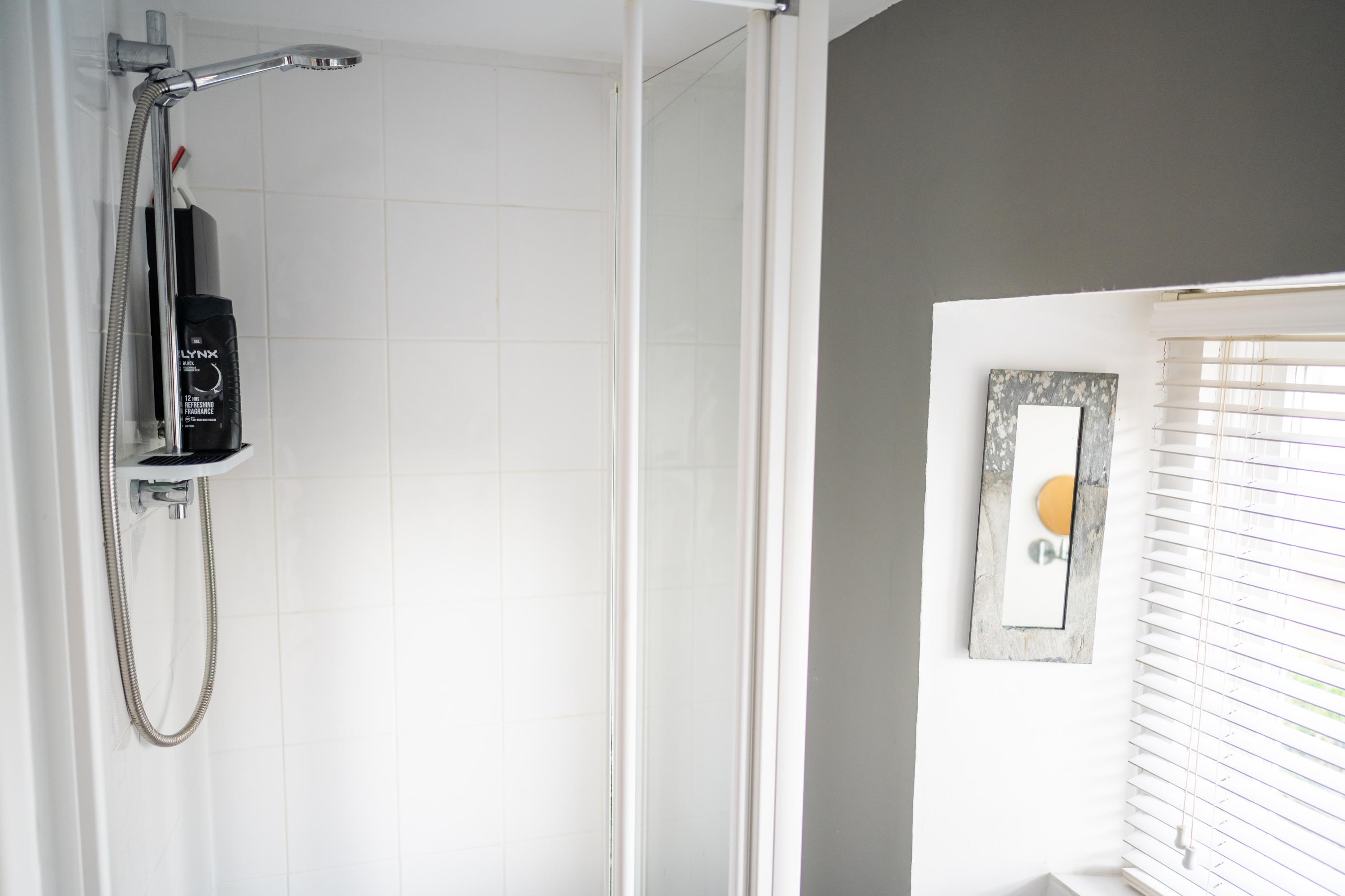 Shower on the ground floor at period characterful Lynch View Cottage in central Lyme Regis 
