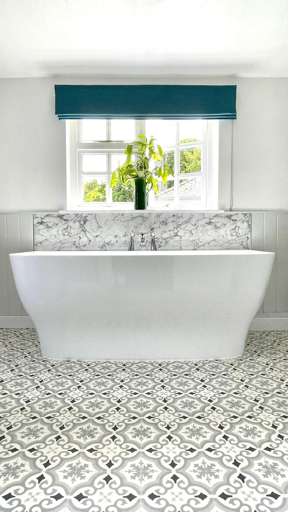 Large spacious bathroom with deep bath and views over the river Lym & the Lynch, this is a brilliant family holiday stay in Lyme Regis. Each bedroom has a bathroom. 