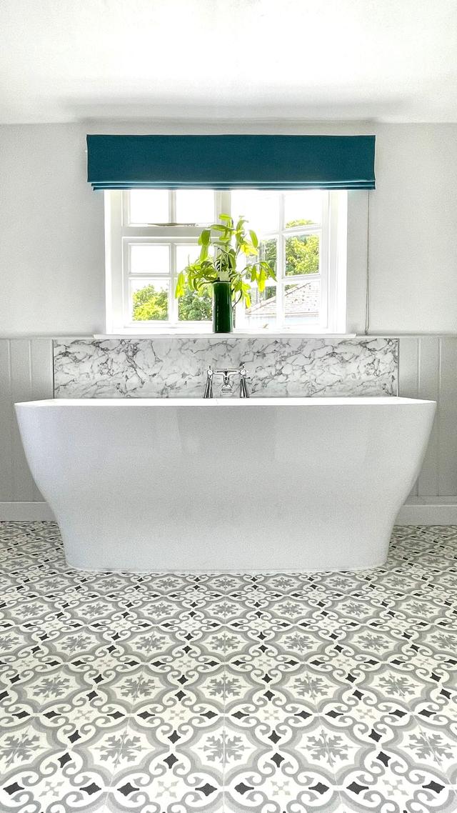 Large spacious bathroom with deep bath and views over the river Lym & the Lynch, this is a brilliant family holiday stay in Lyme Regis. Each bedroom has a bathroom. 