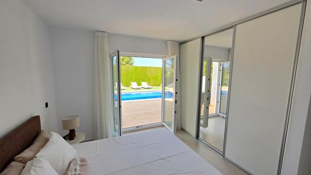 Bedrooms with access to the lower terrace