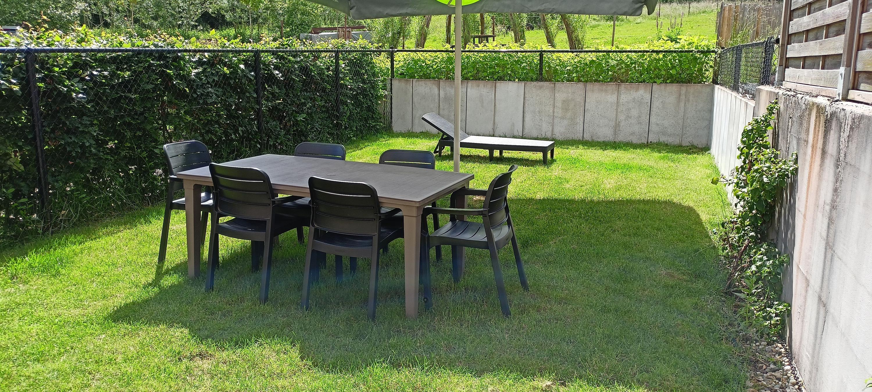 De omheinde tuin van 1,5m hoog