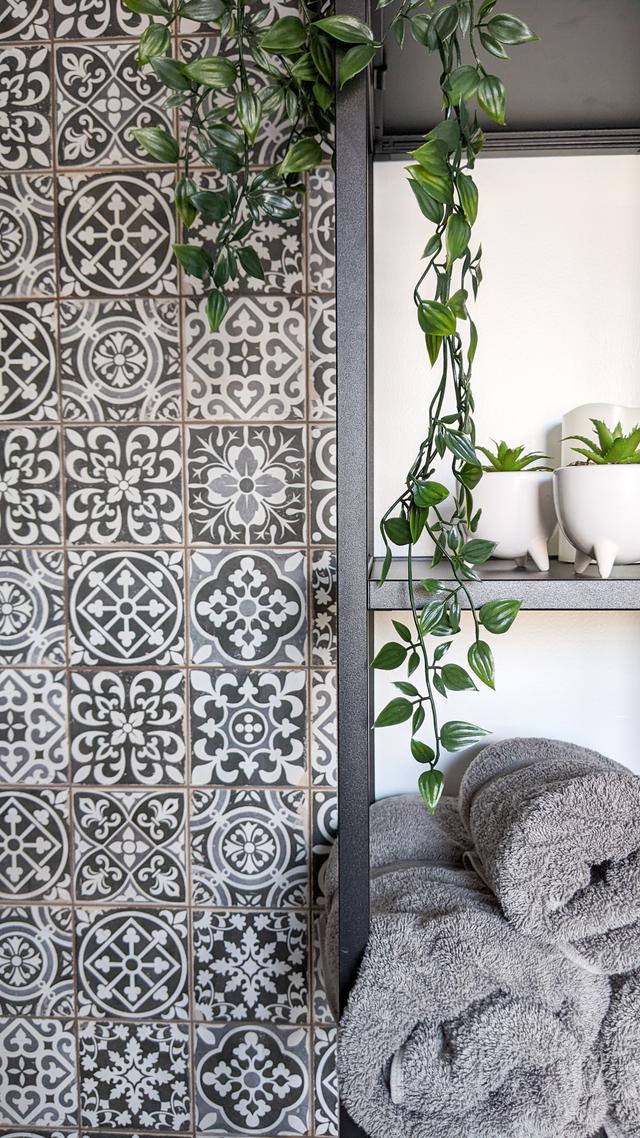 Modern tiles and storage in the bathroom of Seahorse Cottage in Lyme Regis