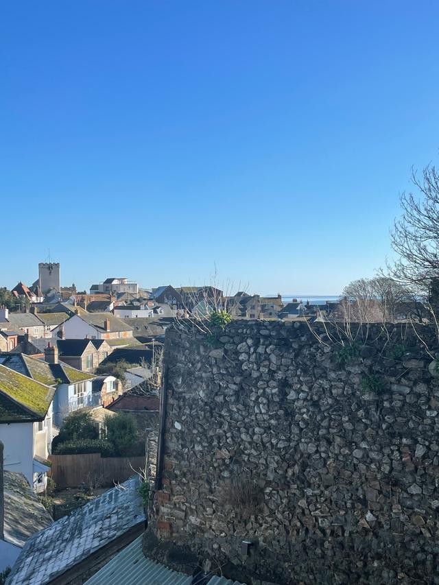 View from bed in the cosy master bedroom at Seahorse Cottage with views of the sea