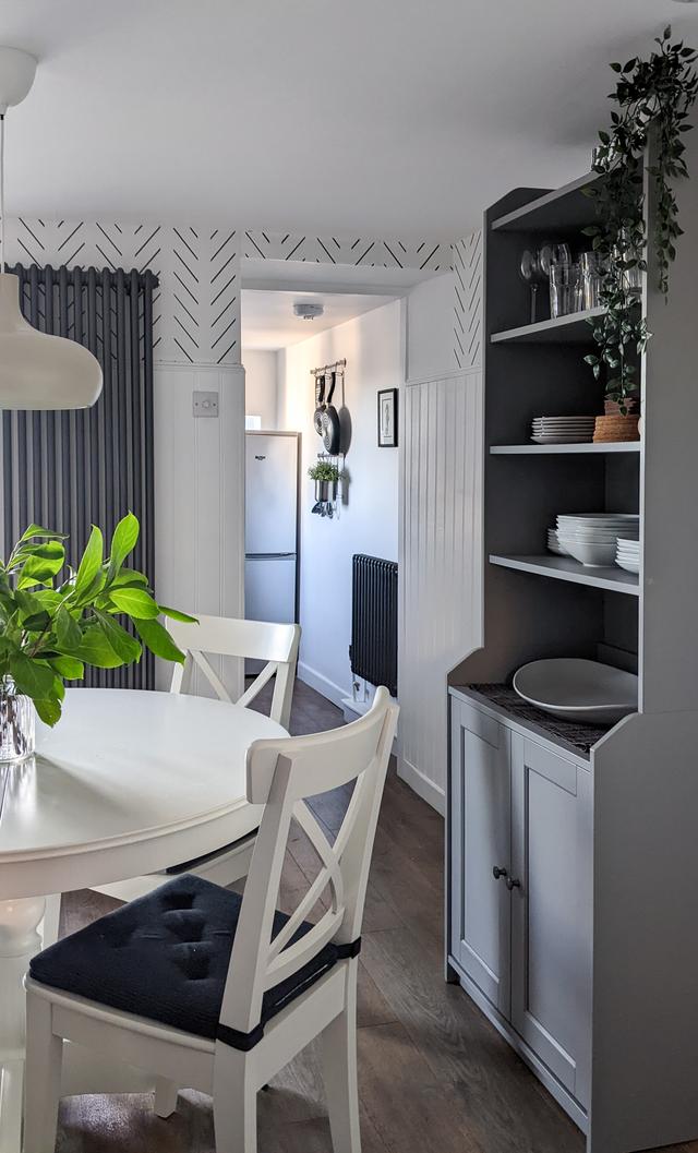 Open plan dining and lounge with view into the kitchen modern contemporary styling scandi style within this 250 year old holiday home in central Lyme Regis