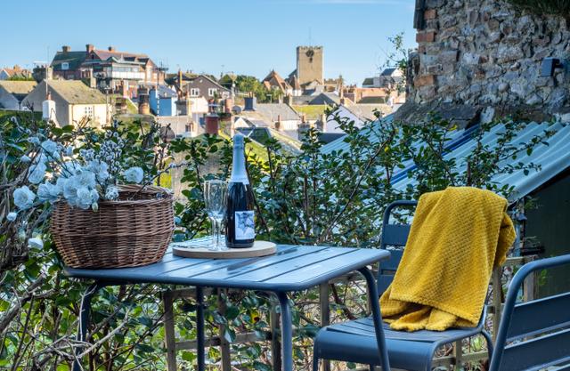 Garden views over central Lyme Regis from Seahorse Cottage walled courtyard garden