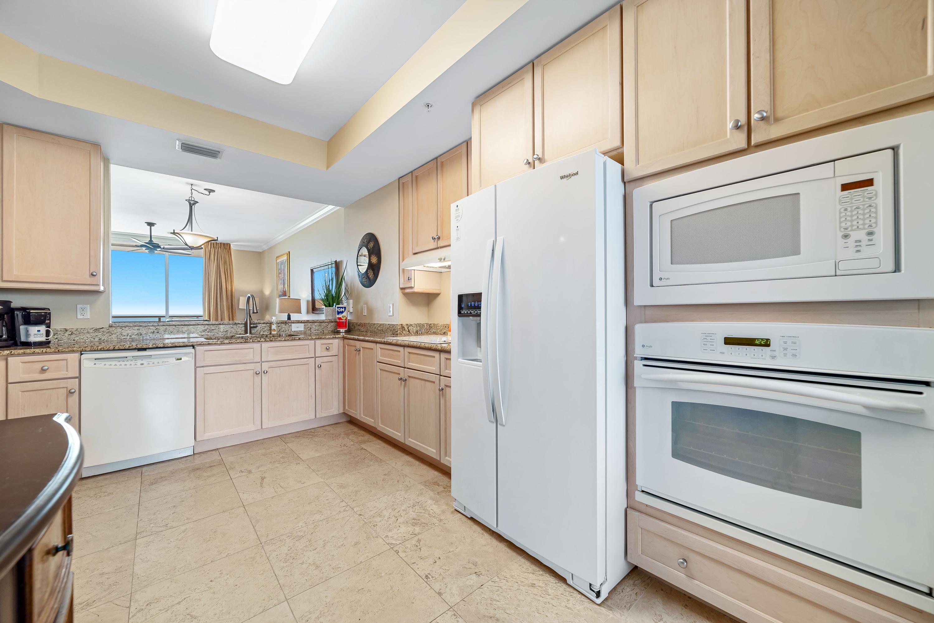 Very large Kitchen, well - lit & complete with everything you can possibly need