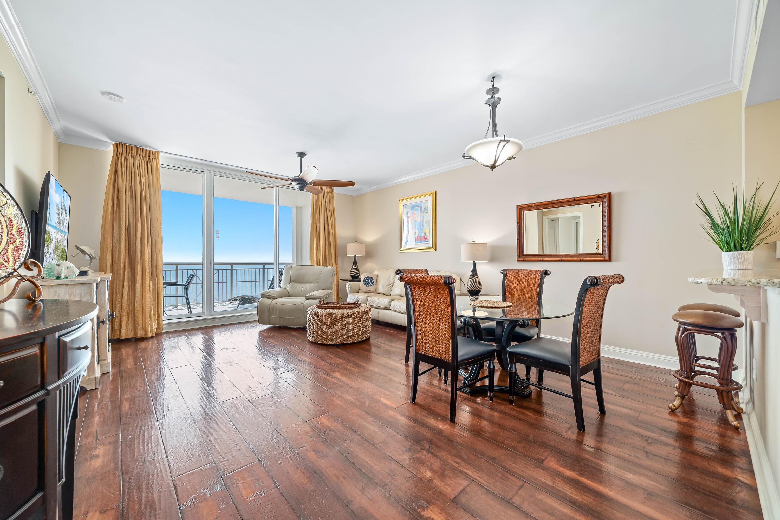 Spacious Living Room and Dining Room overlooking the Gulfside balcony