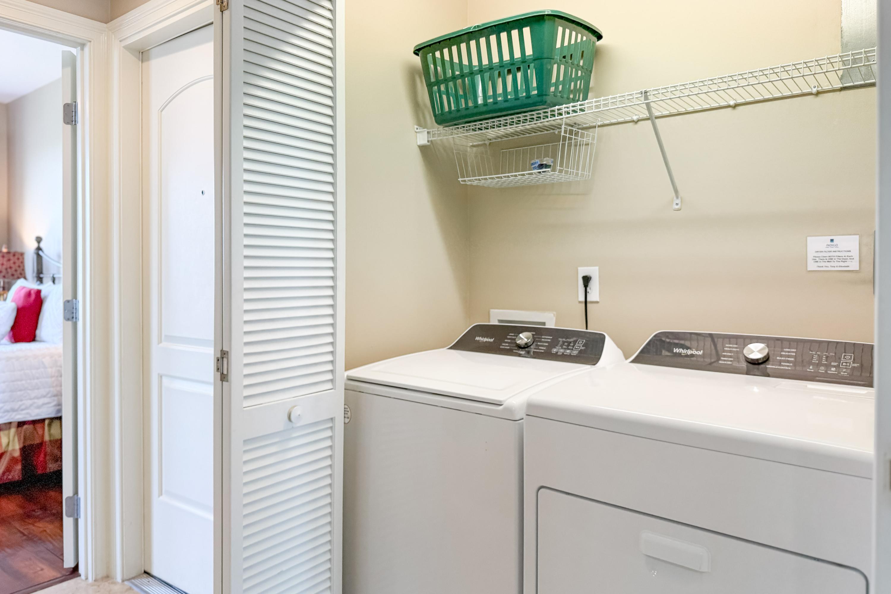 Full size washer and dryer inside the condo.