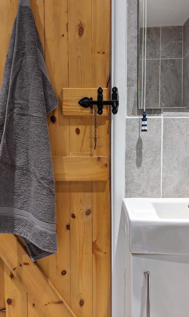 Shower room at Lym River Cottage in central Lyme Regis