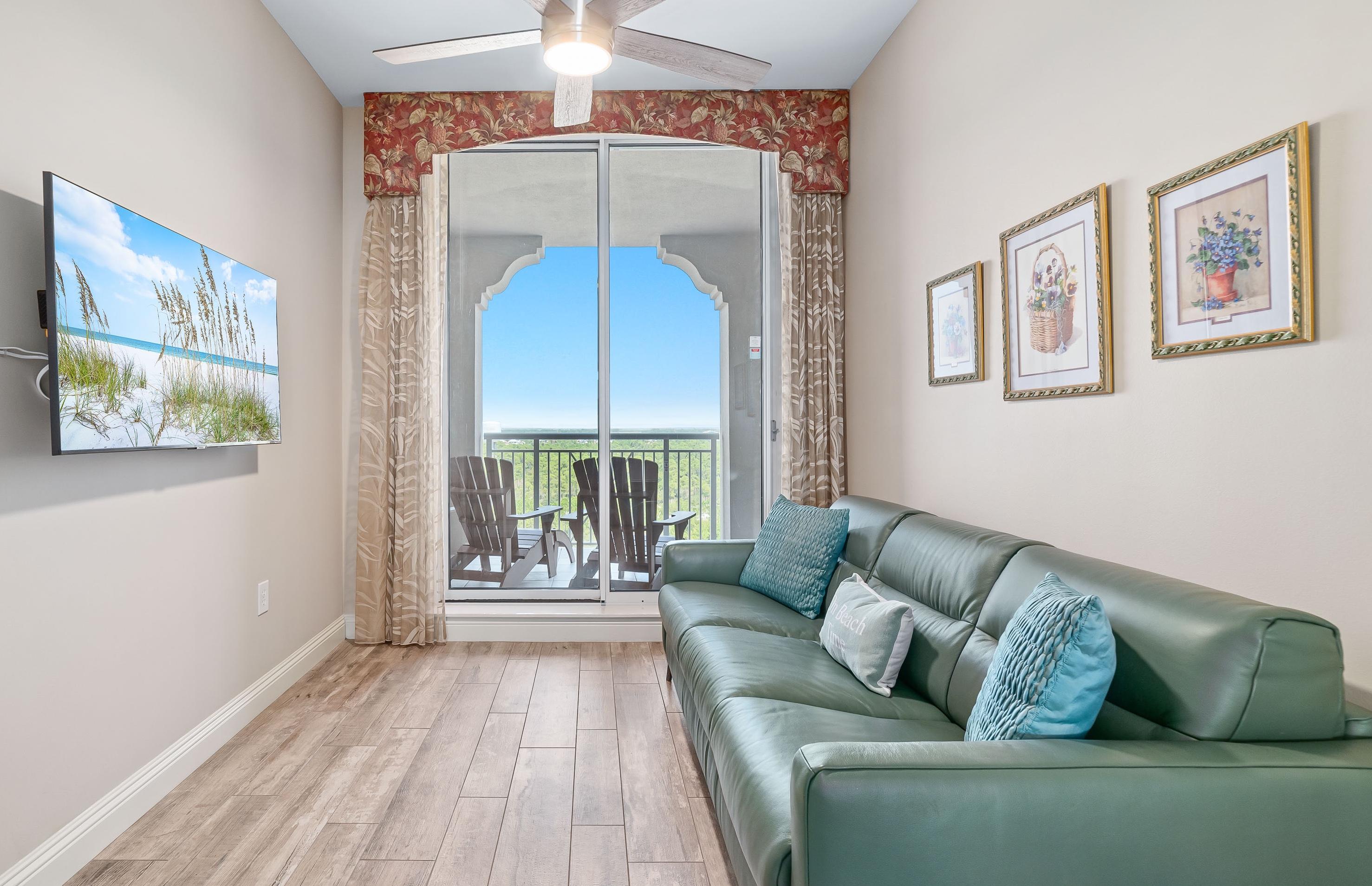 "Bonus Den" with Natuzzi Leather Sleeper Sofa that unfolds easily. Wall 50'' TV