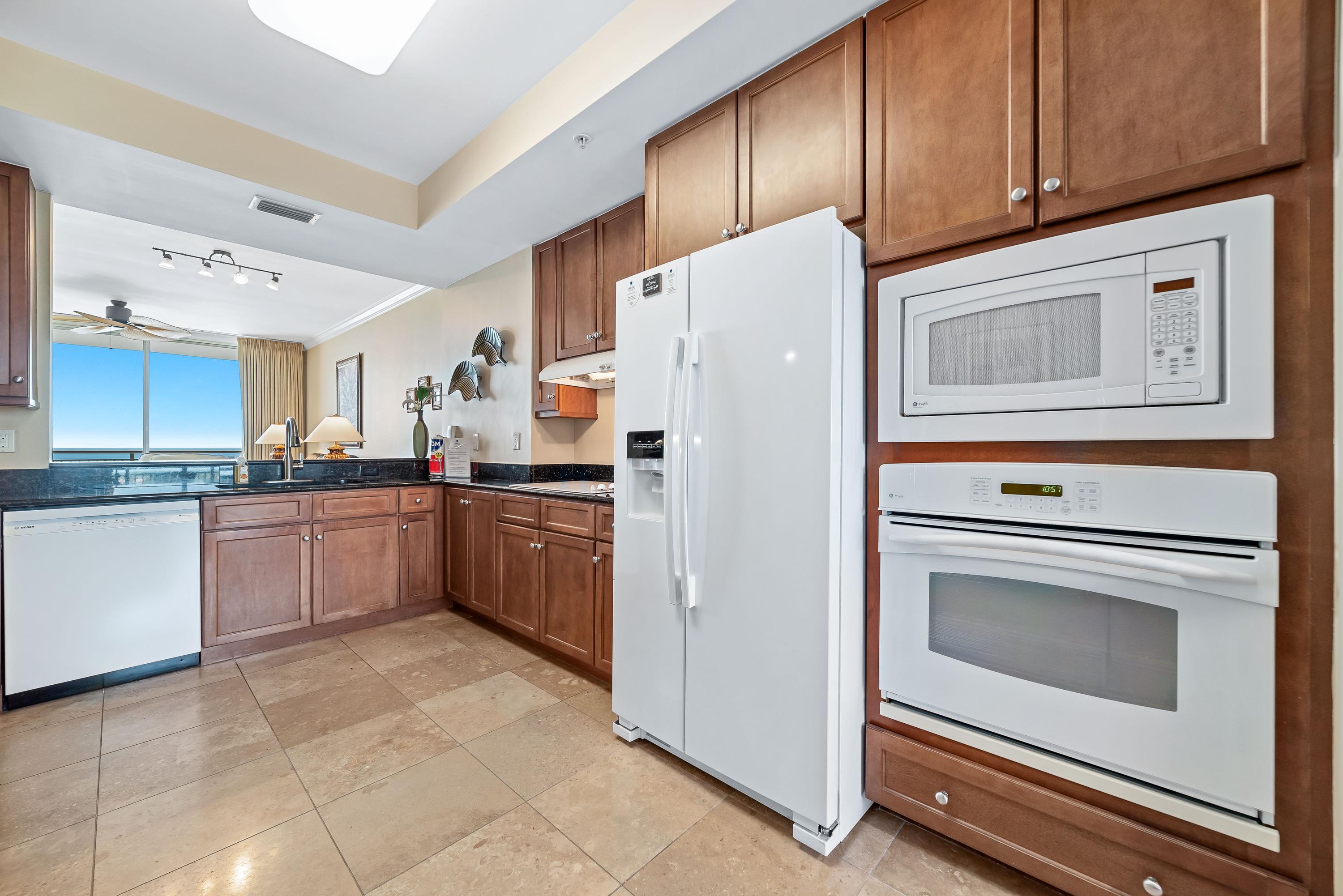 Fully Appointed Kitchen, stocked with multitude of utensils.