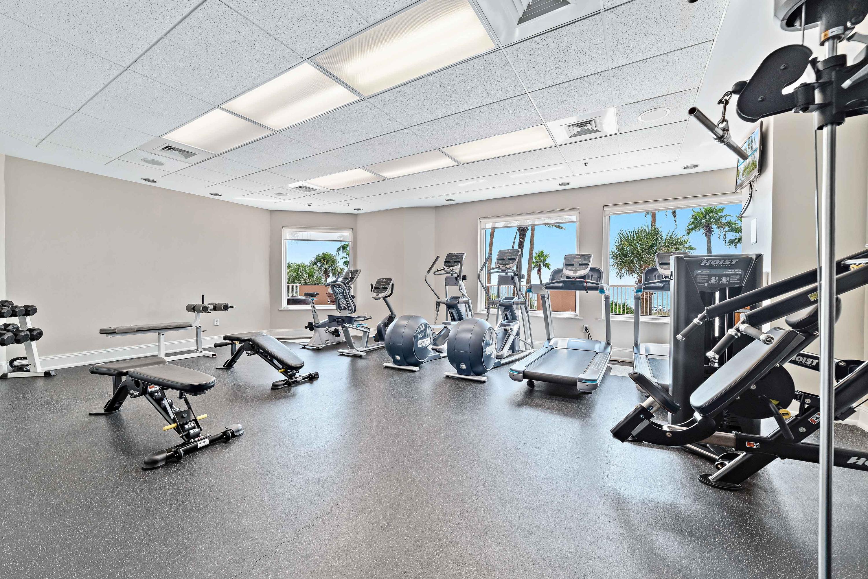 Very well-equipped Exercise Room, featuring new equipment, treadmills, dumbbells