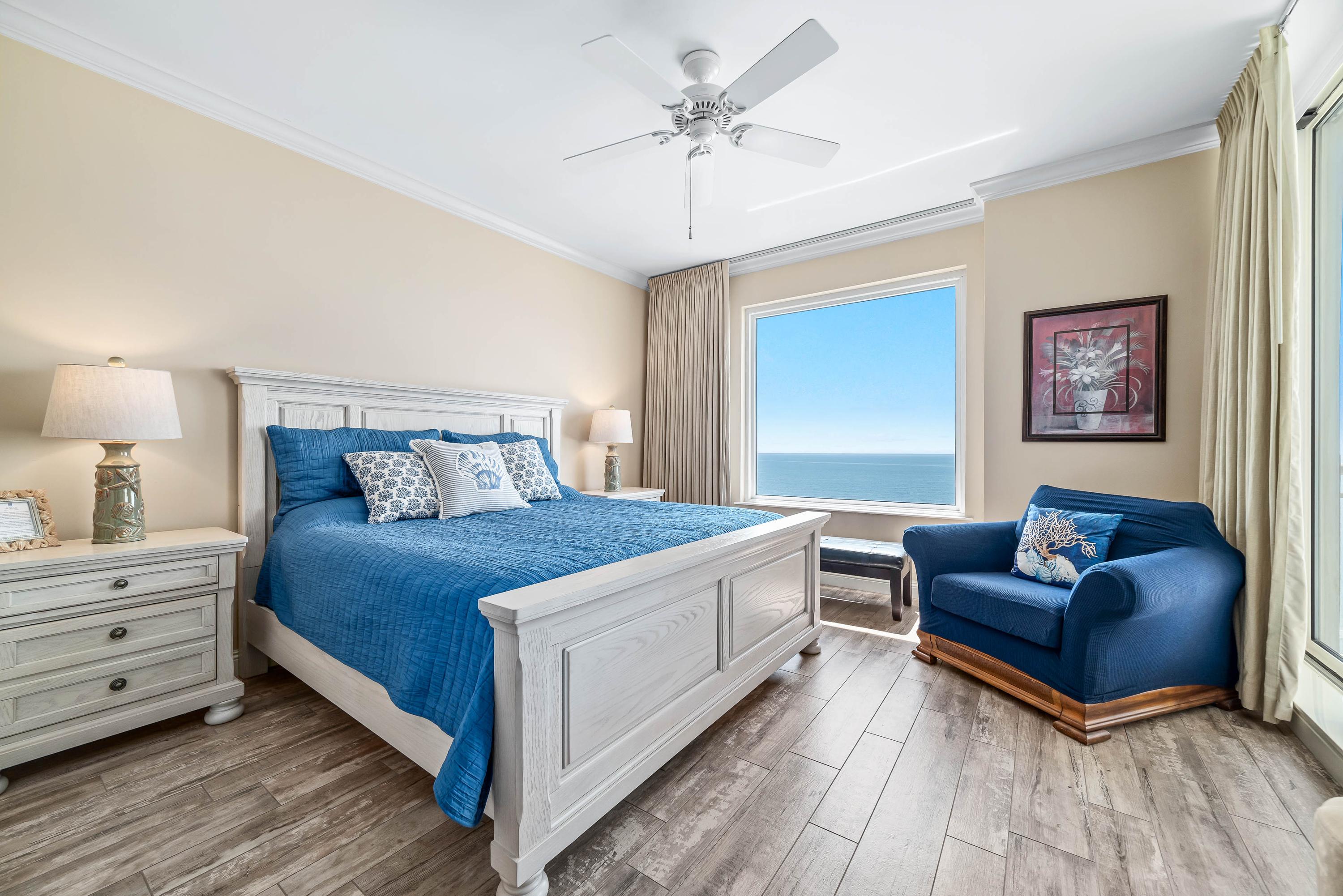 Expansive Master Suite with Large Screen TV, porcelain flooring, Gulfview window