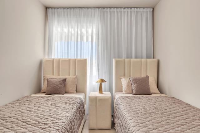Tweede slaapkamer van Casa Sky met twee aparte bedden – perfect voor gezinnen.