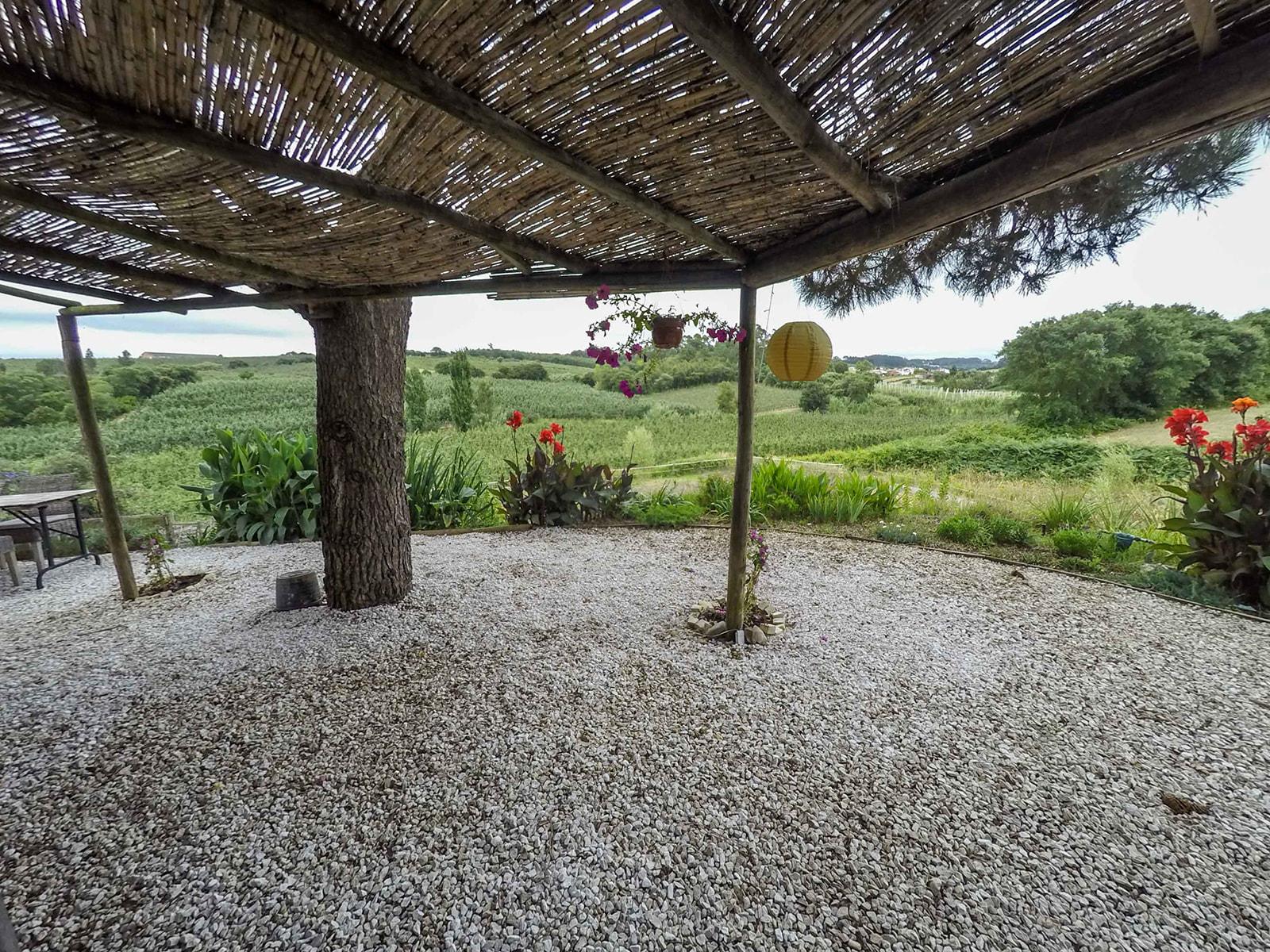 shaded front porch with gravel 