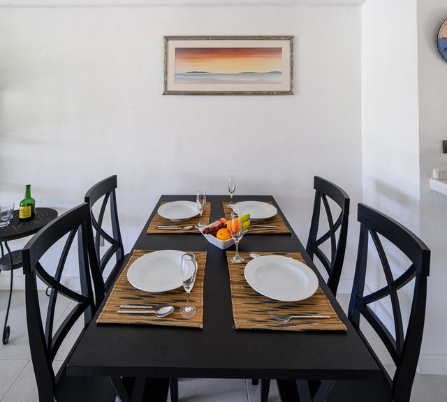 Jolly Harbour Villas  Wild Lotus dining area