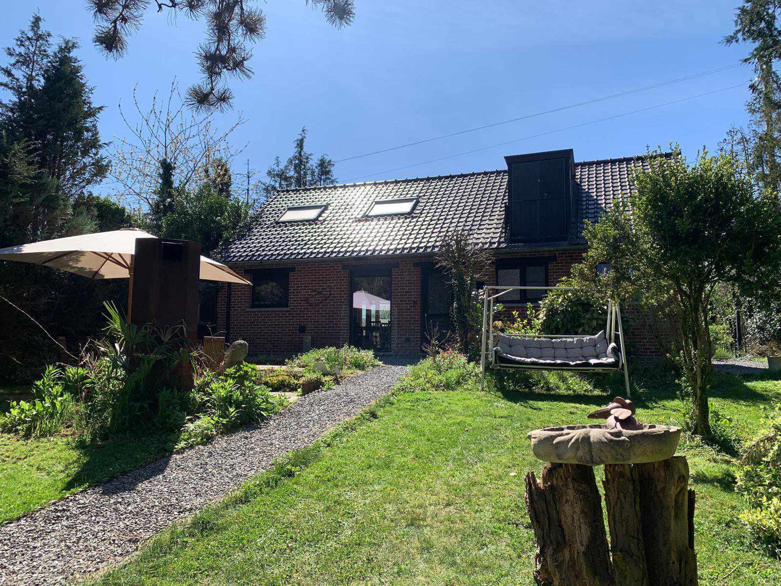 De omheinde tuin