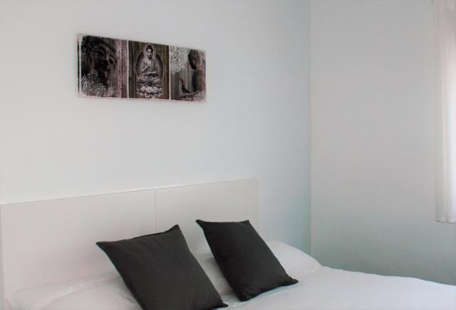 A compact yet tranquil space designed for rest and relaxation.