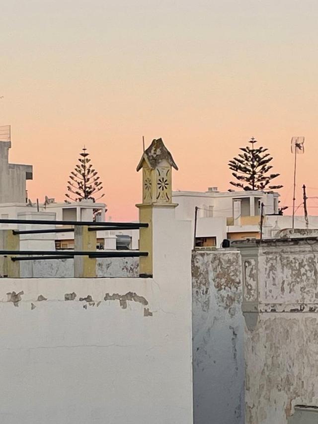 Casa Opala façade with traditional Portuguese architecture in Olhão