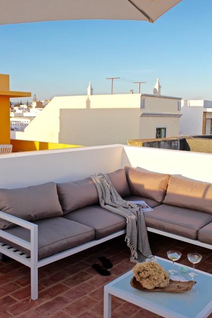 Sun loungers beside the private rooftop pool at Casa Opala
