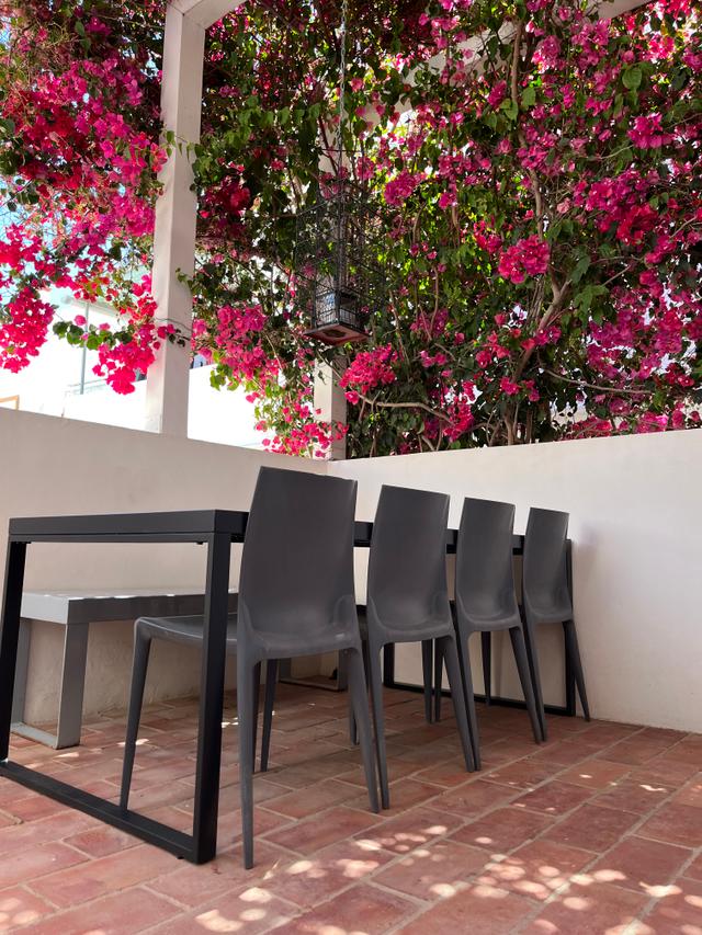 Outdoor dining area on Casa Opala rooftop terrace in Algarve