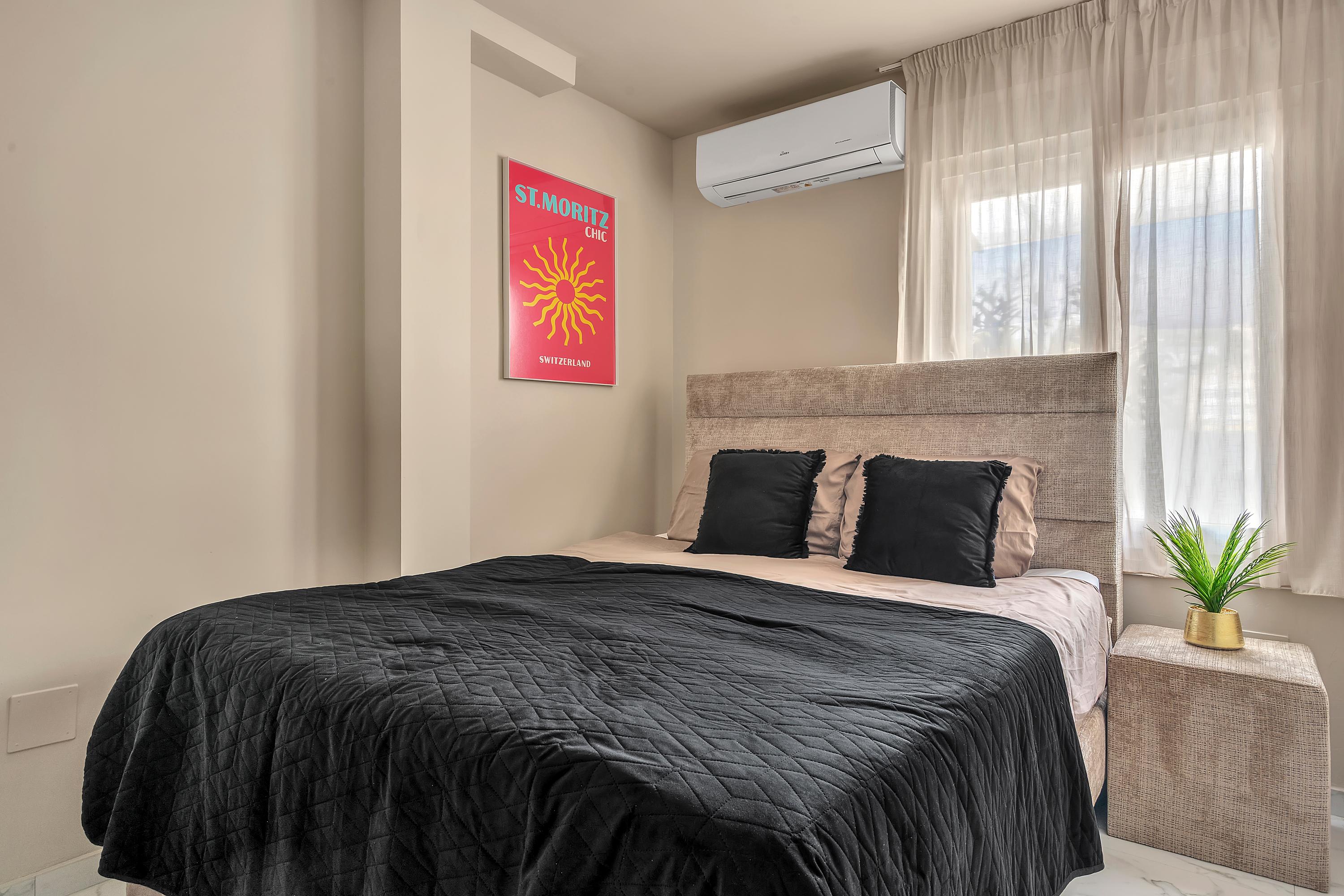 Sfeervolle slaapkamer met oog voor detail en comfort