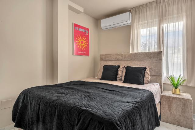 Sfeervolle slaapkamer met oog voor detail en comfort