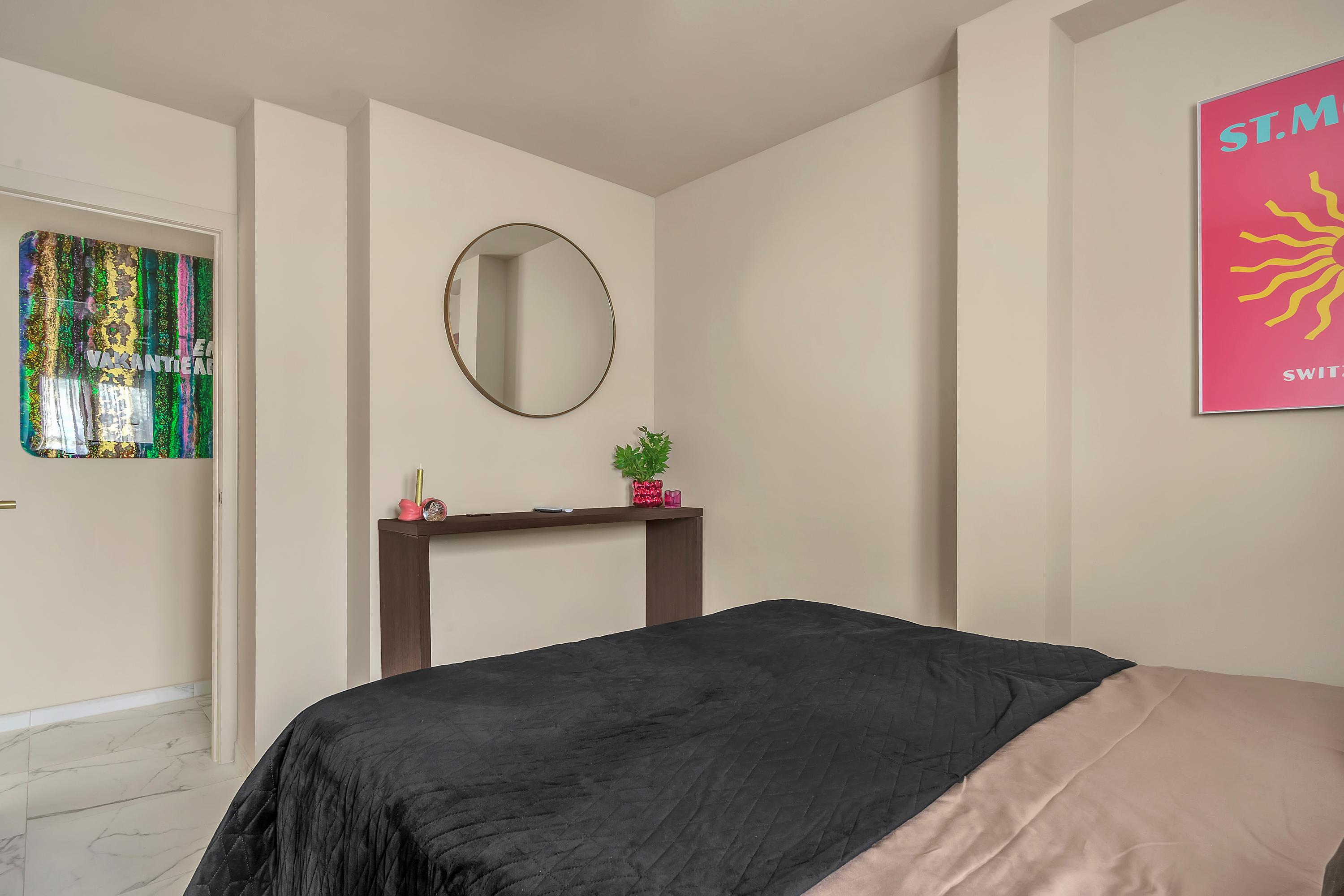 Stijlvolle slaapkamer met een rustgevende ambiance voor een perfecte nachtrust